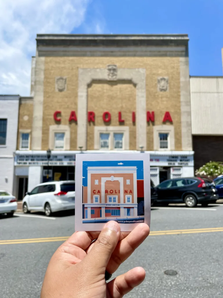 View of the Carolina Theater and the Carolina Sticker designed by Miguel Mena of Beyond Lines