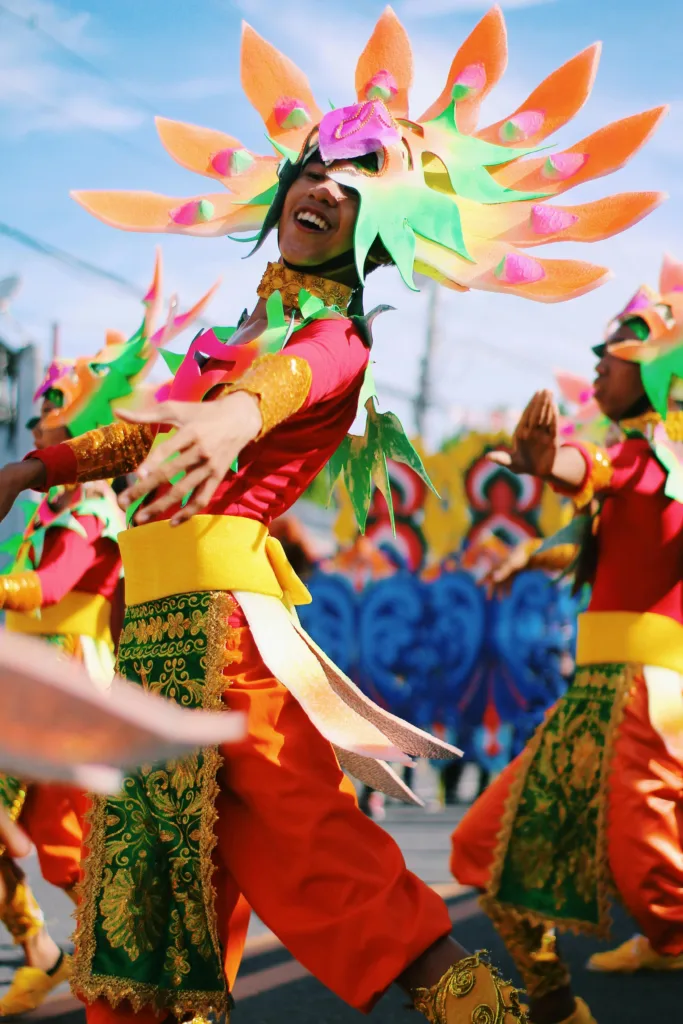 Person wearing a multicolored costumer at a cultural festival in Gubat, Phillipines.